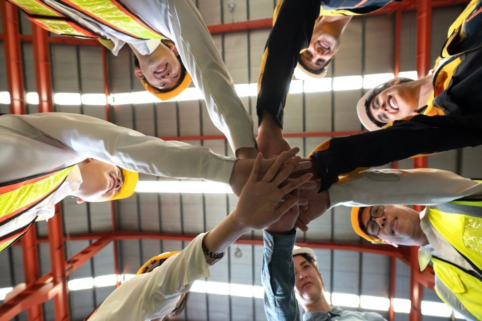 Employee hands in a circle