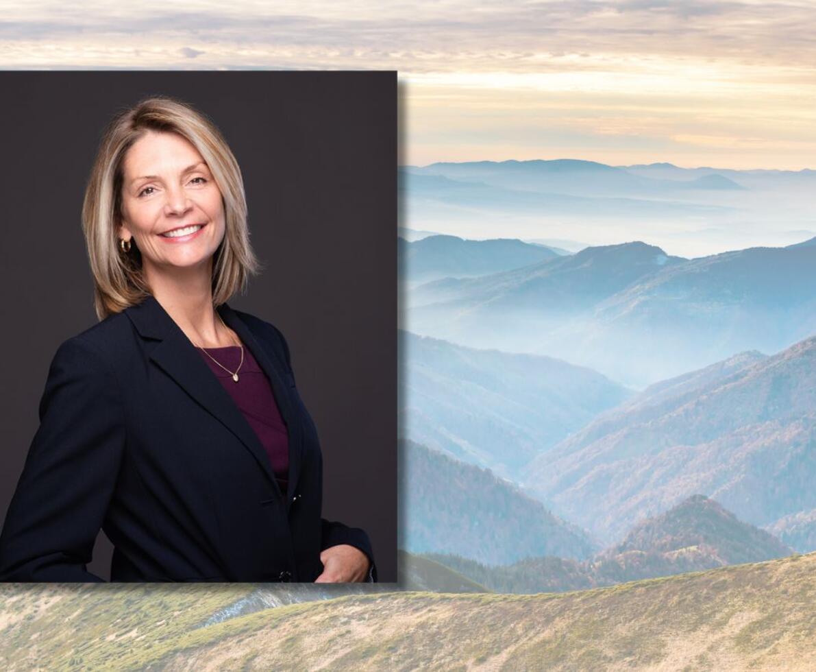Franchise Rock Star Molly Gaffney-Keebler Photo of Molly Gaffney-Keebler over a background of the Blue Ridge Mountains